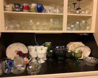 Kitchen: Ice Cream dishes, cups, stemmed glasses, drinking glasses, juicers, platters, milk glass, Indiana glass bowls, vases, and compotes.