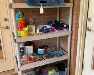 Back Porch: Summer fun center.  Beach toys, beach towels, water jugs and more!