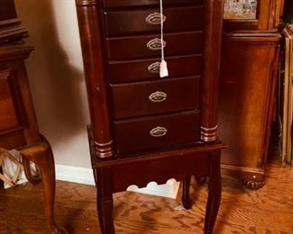 Front room:  Beautiful six drawers, two side doors for hanging necklaces, and lift top with mirror and jewelry storage.  Not pictured... lots of jewelry for sale also.