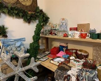 Garage: And Still More Christmas.  Do you know we have at least six trees from two feet to twelve!  Lots of Garlands and wreaths too.  Ornaments, dishes, linens, and lots of candy dishes!