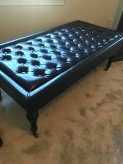 Black Leather Bench with casters ===> $350                     Dimensions: 50" L x 19" H x 23.5" D