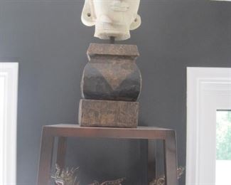 A Carved Stone Head.