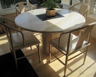 Travertine Table with 4 Horse Shoe Chairs.