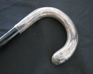 Sterling handled cane.