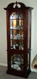 Mahogany curio cabinet.