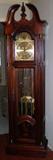 Howard Miller Grandfather Clock with 3 chime settings and moon dial. Excellent condition and runs well.