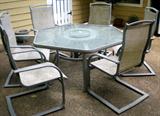 Patio set consisting of table and 6 chairs.