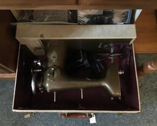 Vintage electric sewing machine with case and accessories 
