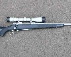 Winchester Model 70, Stainless Boss System with Leupold Scope, Unfired, 2 in 7MM Mag and 1 in .30-06