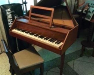 Harpichord piano & chair by Zuchermann need some work. But have all pieces to assemble & manual. We are taking silent bids on this item