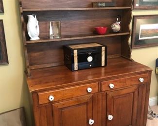 $250 - Pine two-drawer/two drawer open-deck hutch with white ceramic knobs; measures 20" deep, 48" wide, 72" tall.