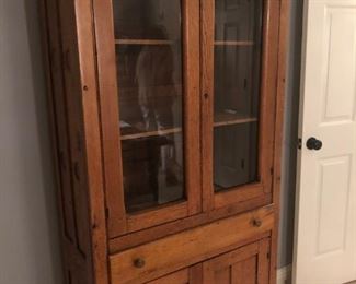 $300 - Antique glass-door pine pie safe; measures 14" deep, 32" wide, 70.5" tall.