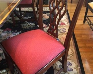 $750 - Council Craftsmen Chippendale-style  mahogany, oval side dining chair. Dining group Includes six (6) chairs. Table comes with two 24" leaves and pads; measures 104" long (with both leaves inserted) and 30" tall.