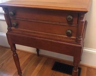 $250 - Antique spool cabinet on legs; measures 17" deep, 22" wide, 29" tall.