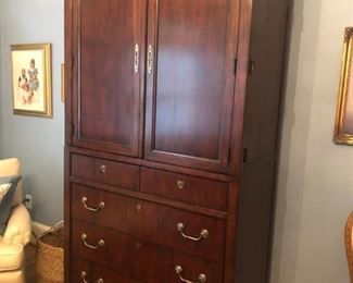 $475 - Henredon mahogany wardrobe/armoire/TV cabinet; measures 21" deep, 44" wide, 88" tall.