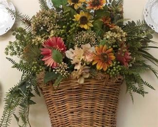$125 - Country French wall floral arrangement in wicker basket.