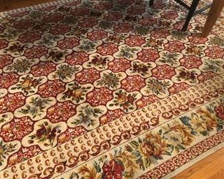 $750 - Beautiful "Jackie Kennedy" wool rug; measures 9'9" x 7'9".