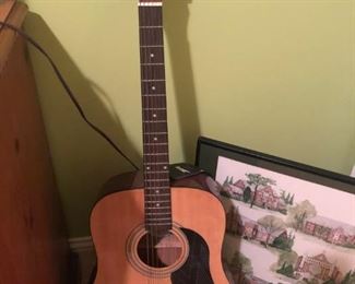 $90 - Acoustic guitar.