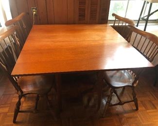 DROP LEAF TABLE OPENED UP W/ 4 CHAIRS