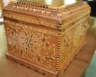 19. Marquetry Chest inlaid with Mother of Pearl $130
Fine workmanship, looks newer. Locks, key present. Approximately 26” wide, 19” deep, 18” tall. Excellent condition