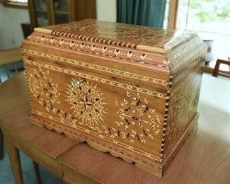 19. Marquetry Chest inlaid with Mother of Pearl $130
Fine workmanship, looks newer. Locks, key present. Approximately 26” wide, 19” deep, 18” tall. Excellent condition