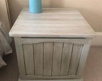 large bin-style tables used as nightstands