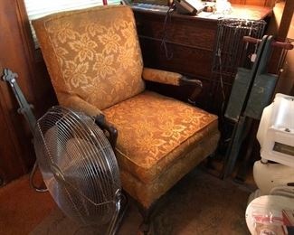 Another fan, gold upholstered chair, oak chest, corn planter, and scales