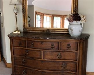 Century Furniture dresser with marble top - 72” wide x 21” deep x 39” high - $800                                                                     Gold framed mirror - $200