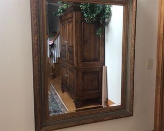 Large wood framed wall mirror