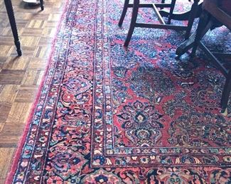 Detail of dining room Persian rug 124" x 8'