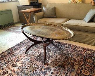 large brass tray on stand coffee table