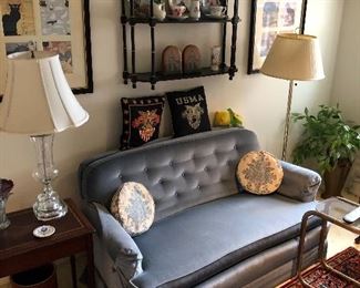 love seat with area of cat scratch on left $75.00, fine hanging shelf, prints, lamps etc