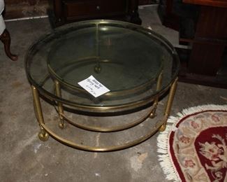 Brass 2 tier rolling coffee table w/ glass inserts