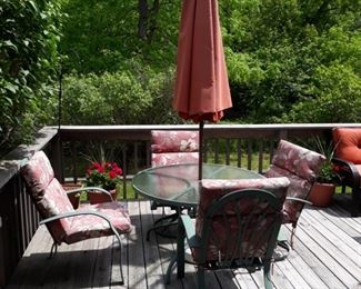 Round table with umbrella  and four chair's 