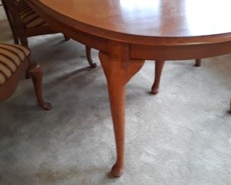 An oval table that has two 20" leaves.