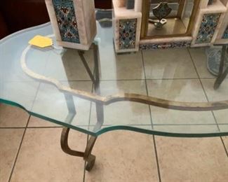 Lot 87 glass top coffee table with wrought iron base 50”x24”x18”. $195 NOW $100