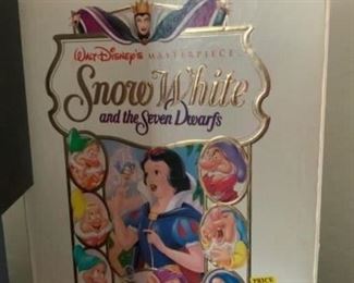 Lot 115- Snow White and the Seven dwarfs vcr and book $15