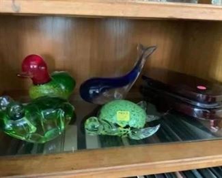 Lot 118-lot of glass animals. Frog$25, duck $25, turtle $25, whale $35 and whale stand $10.  Whale, turtle and fish are sold. 