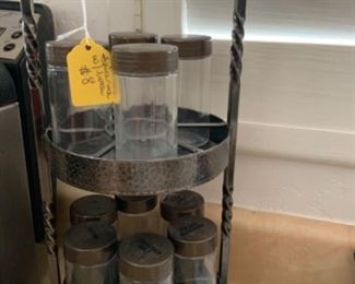 Lot 164- spice rack with 8 bottles. $8 NOW $4