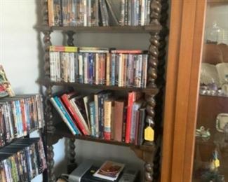 Lot 201-brown bookshelf. $85. DVDs and books $1 each  Bookshelves are NOW $42.50