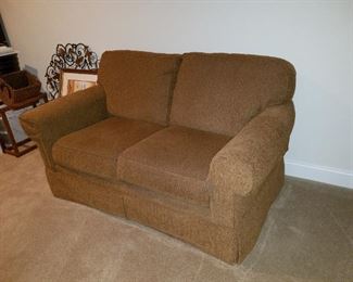 pair tan/brown cloth loveseats