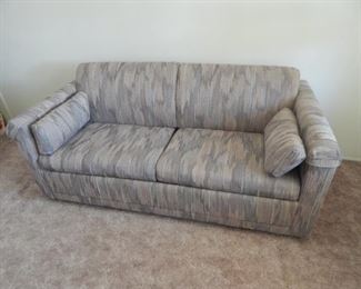 This is a sleeper sofa with a never used Lay Z Boy Mattress