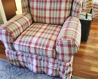 This chair has had a slip over over it and when removed it is in like new condition. Very cozy!