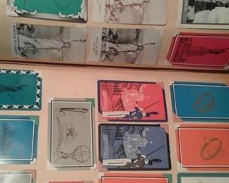 Album full of antique playing cards.  Great graphics