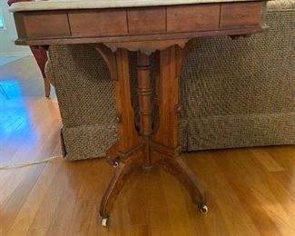 Small marble top table with pedestal base (w/casters)