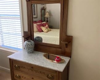 Walnut wood and marble top dresser, carved wood with mirror, Eastlake influenced