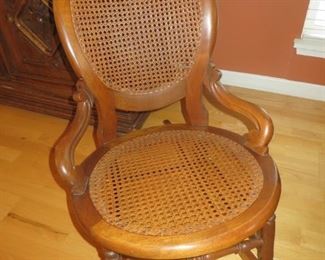 $75% off now $25 $100 Antique American Walnut Cained Rocking Chair