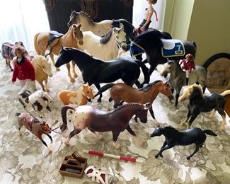 collection of Breyer horses, riders & accessories