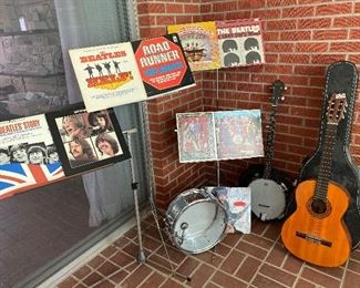 Lots of old records, including Beatles, Kingston trio, the Giants, And more
Musical instruments -drums, banjo and guitar