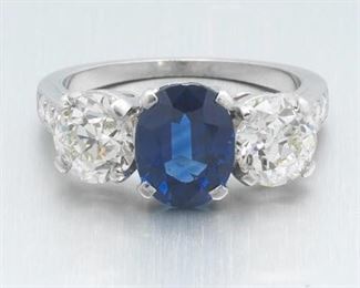  Ladies Retro Platinum, Blue Sapphire and Diamond Ring 